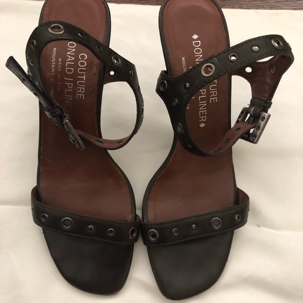 Shoe with strap and eyelets